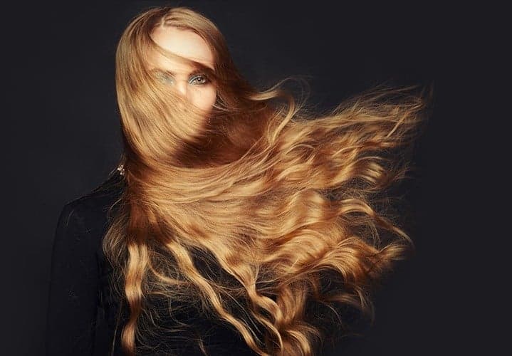 Model with long flowing colored hair